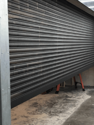 Security shutter style roll-up door installed at a pharmacy